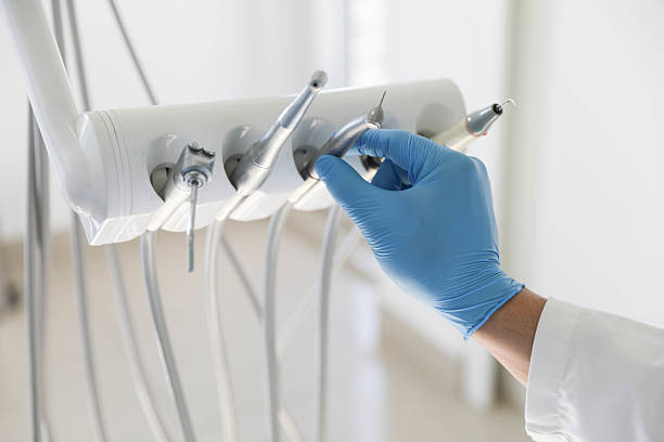 Professional Root Canal Treatment technician working in West End, NY